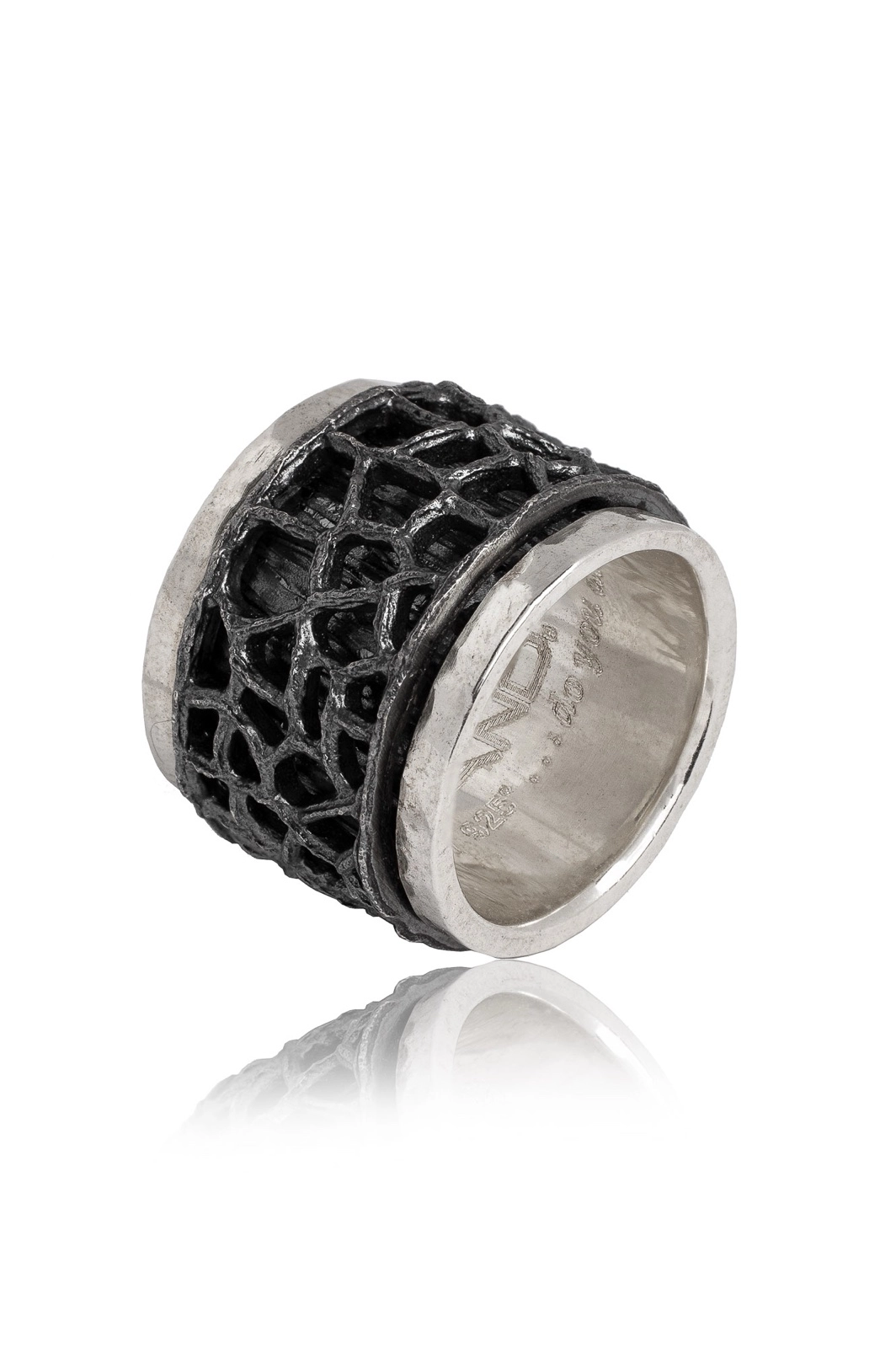 Silver ring with a rotating oxidized lace design